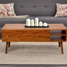 Designed with aesthetics and functionality in mind, enjoy the striking contrast between the finished body and legs. Corrigan Studio Amethy Coffee Table With Storage Reviews Wayfair