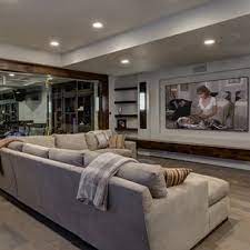 One sofa, three tables, and four chairs. 75 Beautiful Basement Pictures Ideas July 2021 Houzz
