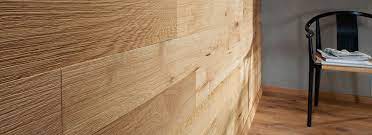 You can hide the exposed edges with trim or molding. Wooden Wall Panelling With Haro Brand Floors