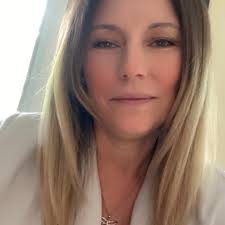 Who is a gentle and experienced groomer for a nervous mini goldendoodle?