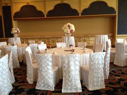 White Linens White Rose Back Chair Covers Lavender Accents Chair Covers White Roses Table Decorations