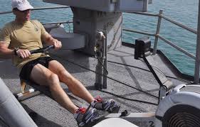 Get your rowing form right grasp the handles of the machine and place your feet flat against the footrest, with your knees bent and your shins. The Effectiveness Of Using A Rowing Machine In Losing Weight Cnt Training Club