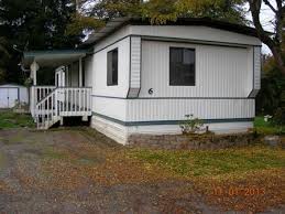 1980 Sandpointe Single Wide In Good Condition Recent Metal Roof With Expanded Eves Wood Deck With C Remodeling Mobile Homes Mobile Home Mobile Home Makeovers
