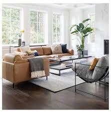 For example, if it's sleek, boxy or lifted off the ground with metal legs, it probably has a contemporary design and will look good with other contemporary decorative elements. Renfrew Leather Sofa 80 Adler Tan Caramel Leather Sofa Renfrew Leather Sofa 80 Adler Leather Couches Living Room Tan Sofa Living Room Leather Sofa Decor
