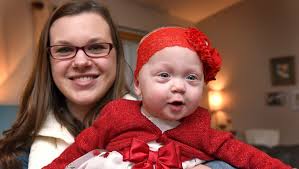 NICU graduate mom helps others parents with NICU babies