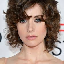 Temper naturally curly hair with some layers may slim your style without changing the overall curl pattern. 40 Stunning Ways To Rock Curly Hair With Bangs