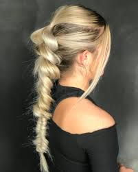 It is a cute idea to make a waterfall braid from your long wavy hair. 30 Prettiest Prom Updos For Long Hair For 2021