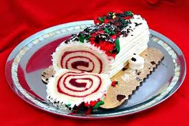 Christmas Yule Log White Cake With Some Red Fruit Jelly Or Cranberry Sauce White Coconut Frosting Yule Log Cake Yule Log Recipe Cake Roll