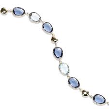 Alternating Tones Of Both London Blue And Sky Blue Topaz Are Bezel Set In A 14k Yellow Go Blue Topaz Bracelet December Birthstone Jewelry Turquoise Jewelry