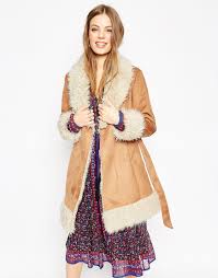 Gorgeous faux shearling with large pocket detail, a faux fur trimmed collar, and snap front closure. Asos Coat In 70s Style Faux Shearling At Asos Com 70s Fashion Shearling Jacket Women Asos Coat
