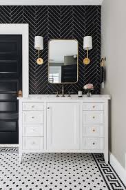 Black And Gold Bathroom Floor Tiles Beside A Black 5 Panel Door A White Washstand Sits On Black And White Vintage Floor Tiles Accented With Black Bathroom Floor Tiles Gorgeous Bathroom Interior