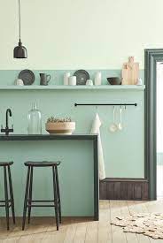 The 25 best ways to paint kitchen cabinets and furniture to give your space a new look much of the hesitation in redoing wood furniture at home comes from a concern about the paint. Painted Kitchen In Soft Shades Of Aquamarine Blue Deco Cuisine Bleu Kitchen Shades Lifestyle Cook Coking D Sage Green Kitchen Trending Decor Interior
