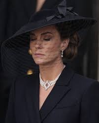 Kate Curtsy to The Queen Coffin