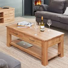 This coffee table with drawers has 4 drawers and a shelf and measures 42 x 42. Mobel Oak Four Drawer Coffee Table Wooden Furniture Store