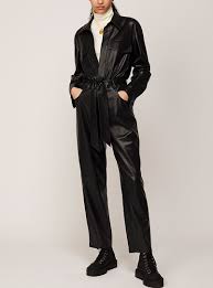 Anushka's airport looks are all about comfort and this look is proof of the same. Ashton Faux Leather Jumpsuit Nanushka Simons