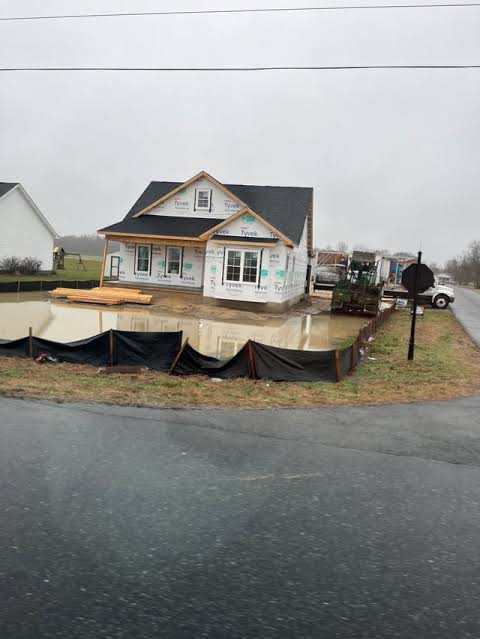 New house being built down the road. Would you be worried with this much  water laying around after a little rain? : r/Homebuilding