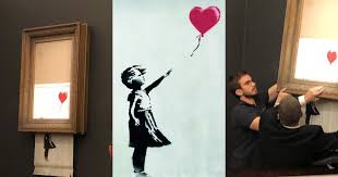 Banksy's love is in the bin is unveiled on october 12, 2018, at sotheby's in london. An Artwork By Banksy Shredded Itself After Selling For 1 3 Million At Sotheby S