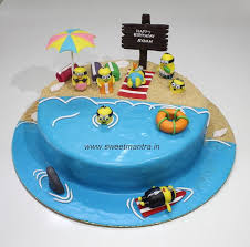The wow factor for this cake comes from the decorated cookies—sharks, dolphins, fish, seahorses, and octopuses. Beach Party Cake Tutorials How To Make A Beach Theme Cake