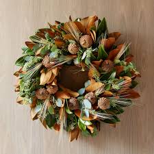 Your neighbors may be willing to let you cut several blossoms for free or for a nominal fee. Magnolia Wheat Wreath