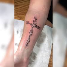 The cross can hold plenty of significance, especially for those who want to always be reminded of their spirituality, or of a loved one. Tattoo Uploaded By Shayne Kilgore Floral Cross Tattoo Done On Arm Valley13tattoo K1lgor3 1175174 Tattoodo