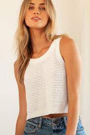Style & co delivers the perfect look for beach days and weekend getaways with this sleeveless knit dress, detailed with a relaxed fit and a pretty floral print. Boho Knit Tank White Loose Knit Tank Top Sweater Tank Top Lulus