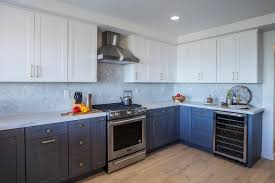 Our 1x2 inch recycled glass tiles in a stormy grey and blue color scheme were custom blended for this backsplash! Contemporary White Kitchen With Gray Tile Backsplash Hgtv