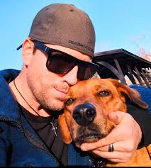 Shepherd with degenerative myelopathy, using wheels