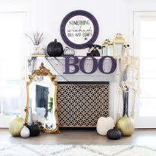 Just call me… um… something clever… uh… shoot. Diy Antiqued Halloween Mirror And Halloween Mantel Classy Clutter