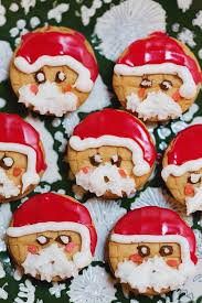 Then, place cookies into a tin or plastic container with wax paper between each layer. Nutter Butter Santas Snowmen Diana Elizabeth
