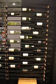 Leaning wine bottle holder, this is crafted from a genuine wine barrel stave. Wine Rack Designs That Impress With Their Originality And Flair