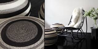 Patterned, black and white pouf in pastel dining room interior with colorful chairs standing at a wooden table. Cana Flecha Poufs L Aviva Home