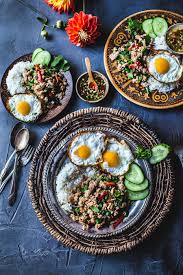 Spicy minced chicken sauteed with chopped garlic, bell pepper, onion, bamboo shoots gra prao fried rice. Thai Basil Chicken Pad Kra Pao Simply Suwanee