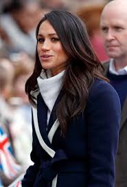 Her hair was very big and curly in the childhood photos that are floating around on the internet. Meghan Markle S Red Highlights Meghan Markle Hair Black Hair Caramel Highlights Chunky Blonde Highlights