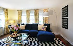 Navy Blue Sofa With Black And White Accents Blue Sofa Living Blue Sofas Living Room Eclectic Living Room