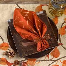 How to fold napkins for thanksgiving. 22 Festive Christmas Napkin Ideas That Will Instantly Upgrade Your Holiday Table Easy Napkin Folding Thanksgiving Napkin Folds Napkin Folding