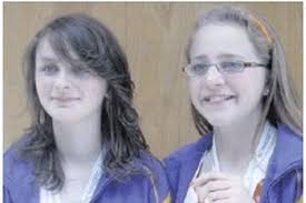 Talented singers Mollie and Lauren secure bronze medals