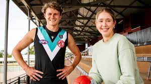 From the original blue and white, to magenta, to prison bars and most recently, back in black. Lucy Burford S Port Power Afl Jumper Design Kidsnews