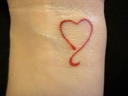 Attractive Tiny Red Heart Feminine Tattoo On Wrist Small Heart Tattoos Wrist Tattoos Girls Cool Wrist Tattoos