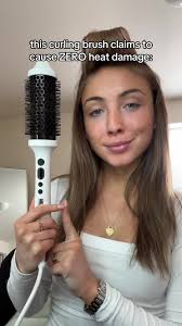 Katie Curling Her Hair