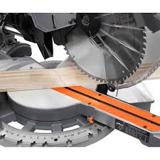 To unlock the head of the saw, press the handle on the saw down . Ridgid 15 Amp 12 In Dual Bevel Sliding Miter Saw