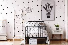  kids room wallpaper wall mural cactus, white and green. White Ladder Against White Wallpaper With Black Dots In Monochromatic Stock Photo Picture And Royalty Free Image Image 85015678
