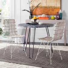 When in doubt, a good white tulip table is a great place to start when decorating your dining room. White Wash Coastal Dining Chairs Kitchen Dining Room Furniture The Home Depot
