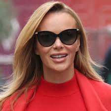 Amanda Holden, 51, looks sizzling in figure-hugging red hot dress