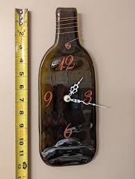 Dark Brown Wine Bottle Wall Clock With Copper Colored Accents and White  Clock Hands