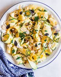 Slice zucchini into about ¼ to ½ slices, onions into thin rings, slice garlic cloves and cut pepper into strands. Marinated Zucchini Salad With Corn And Feta Le Petit Eats