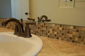 It often looks gorgeous in vintage style bathrooms, especially with subway tiles. Tile Backsplash Glass Squares Bathroom Tile Backsplash Bathroom Bathroom Backsplash Diy Tile Backsplash Bathroom Vanity