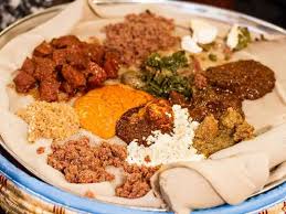 Injera The Teff Supergrain Bread And Vegan Food In The Ethiopian Kitchen You Might Find Meat But Also A Lot Of Veg Ethiopian Food Food Ethiopian Restaurant