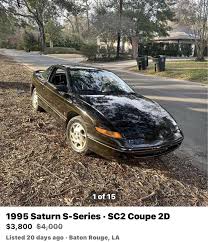 Image result for Black Gold 1995 Saturn