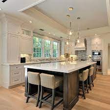 It is white with concrete stain and comfy white chairs. Interior Design On Instagram Flawless By Jpdadevelopment Kitchen Design Small Kitchen Island Design Beautiful Kitchens