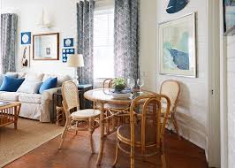Amelia dining table and four chairs set, light brown top with distressed white base. Sandpiper Cottage C 1950